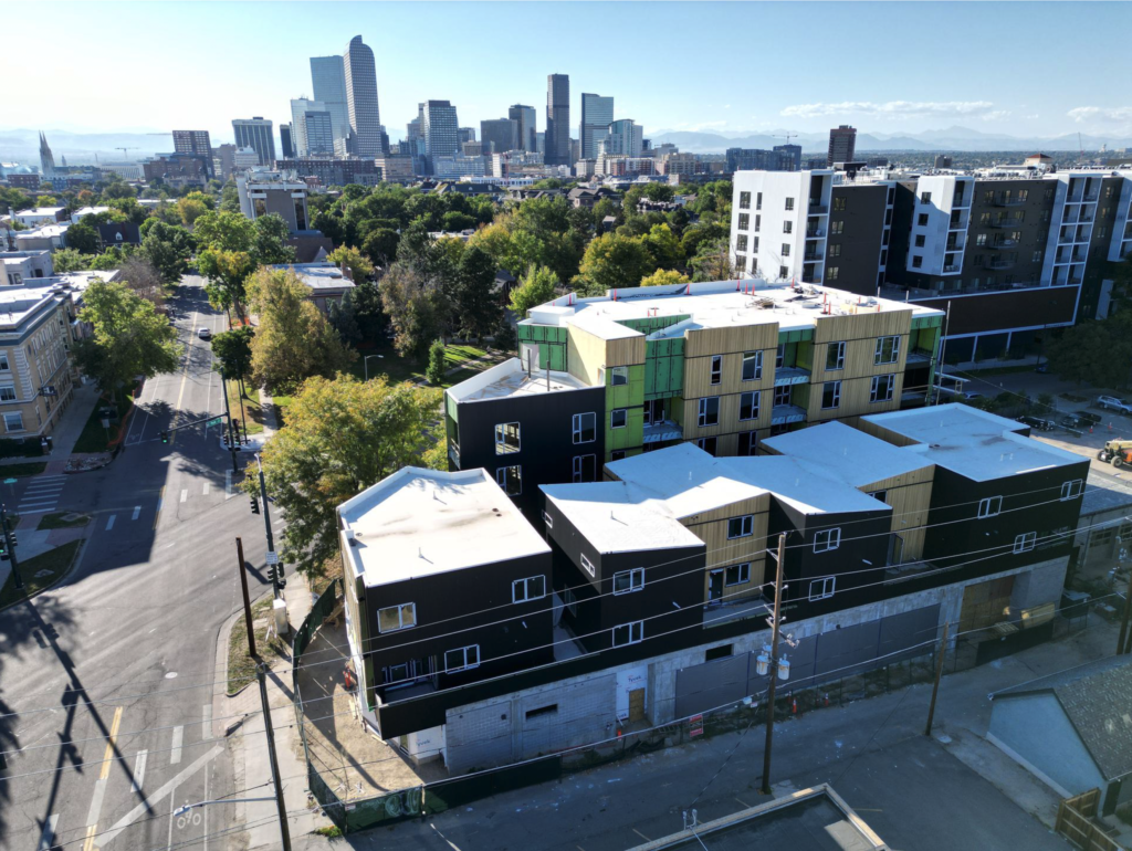 Drone photo of The Arbory with Denver skyline in background